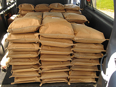 A large order of 7-grain flour and cereal, ready for UNFI pickup