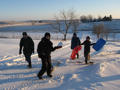 We have the best sledding hills here on our farm