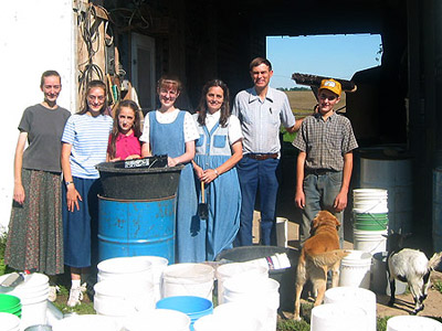 A family picture in front of the crib, September 2006